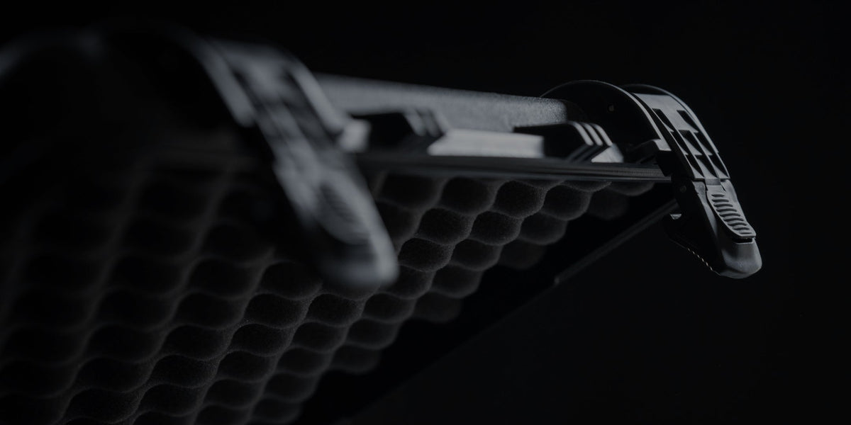 Close-up of a black Condition 1 case latch and lid